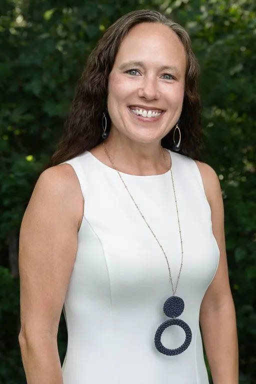 headshot of Carrie Noel, the office administrator of Compass Insurance Group